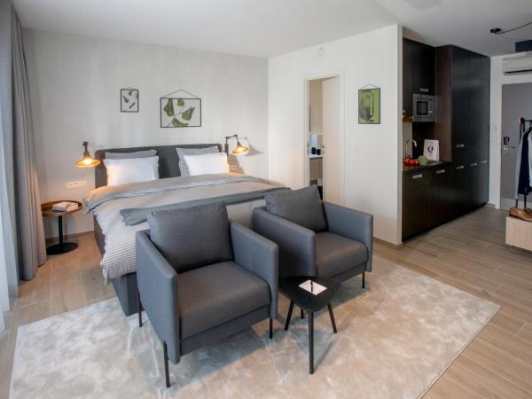 Qstay Good Living Apartments : photo 4 de la chambre appartement deluxe