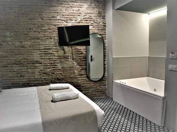 YOU & CO. Quart Boutique : photo 3 de la chambre chambre double avec baignoire spa