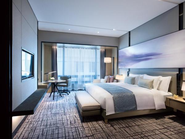 Crowne Plaza Shanghai Pujiang, an IHG Hotel : photo 1 de la chambre chambre lit king-size standard avec accès au salon