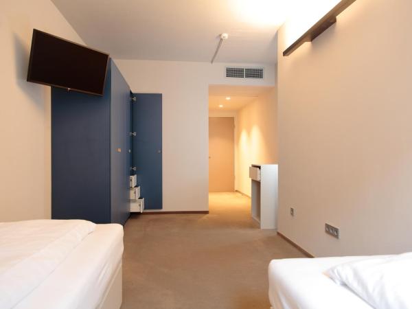 Maverick Urban Lodge : photo 7 de la chambre chambre lits jumeaux standard