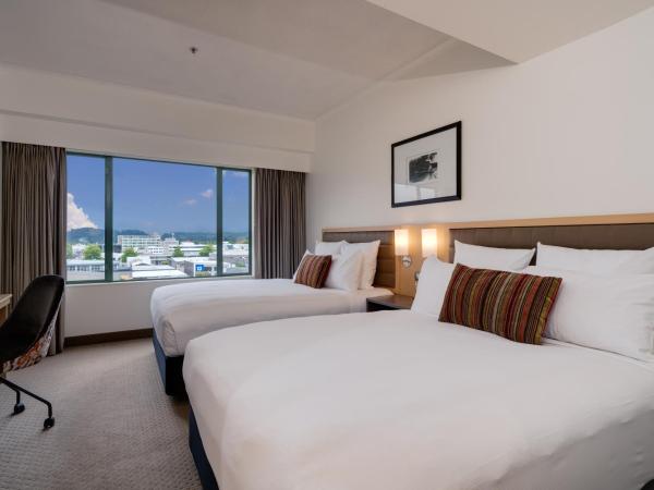 Novotel Rotorua Lakeside : photo 1 de la chambre chambre lits jumeaux supérieure avec 2 lits doubles