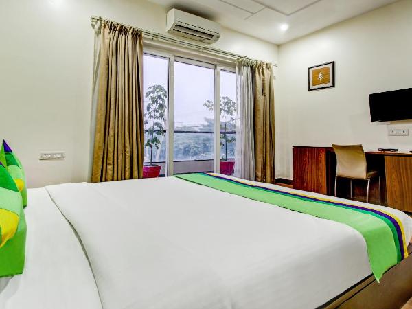 Treebo M2M Residency Sector 46 : photo 9 de la chambre chambre double deluxe