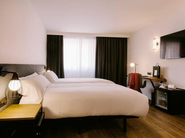 Yomo Centric : photo 6 de la chambre chambre familiale lits jumeaux