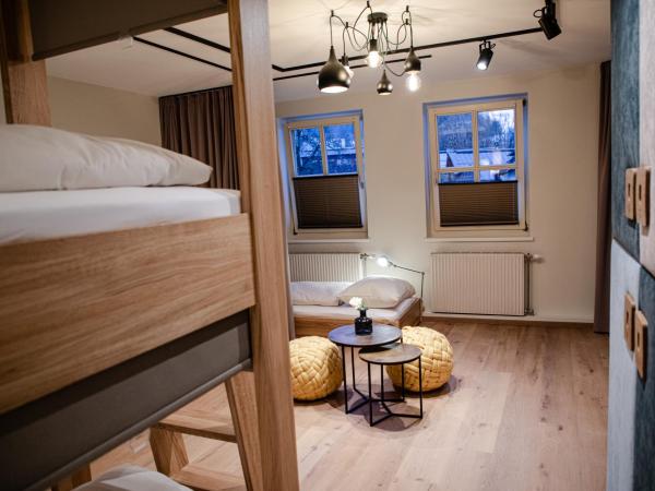 Roomie Alps Design Hostel : photo 6 de la chambre lit simple en dortoir féminin (8 adultes) 