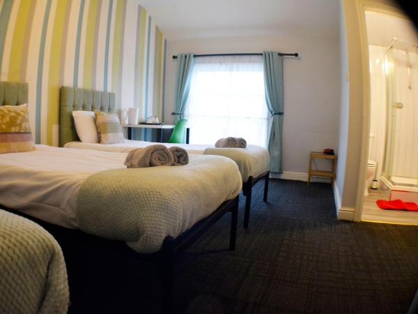 Queens Guesthouse Manchester : photo 6 de la chambre chambre triple confort