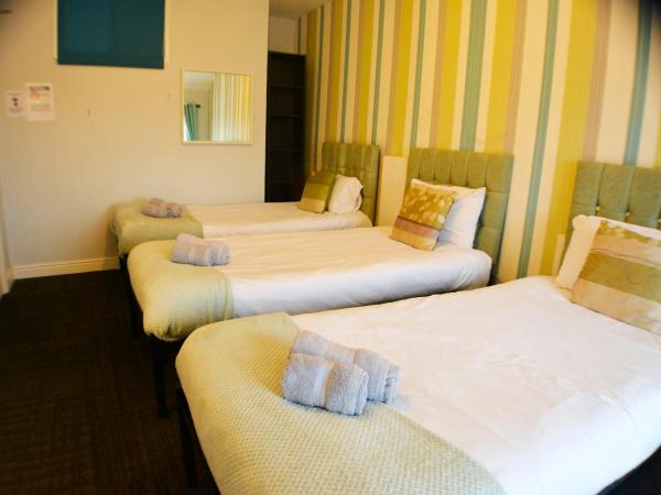 Queens Guesthouse Manchester : photo 2 de la chambre chambre triple confort