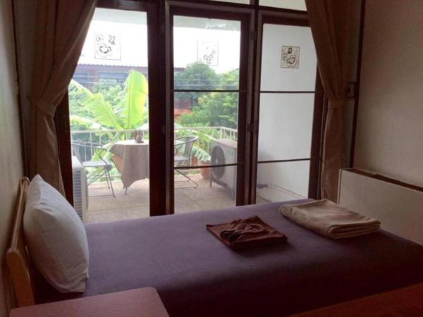 Naturbliss Resort Village : photo 6 de la chambre chambre simple avec salle de bains commune
