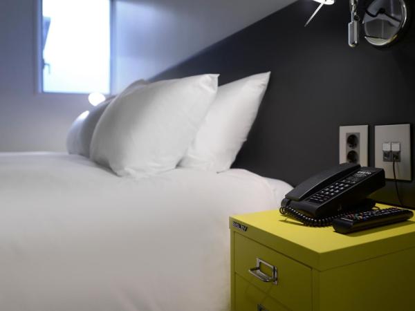 Creto Hotel Myeongdong : photo 4 de la chambre chambre lits jumeaux familiale avec netflix