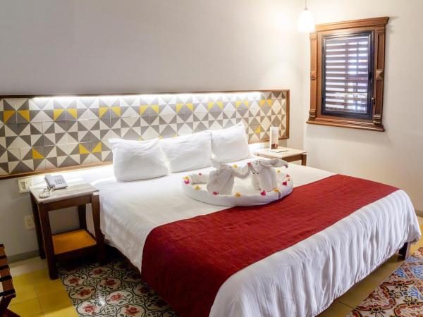 Hotel Caribe Merida Yucatan : photo 6 de la chambre chambre lit king-size supérieure