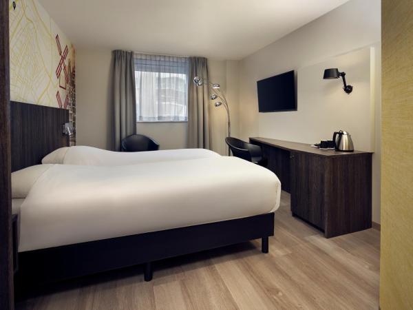 Inntel Hotels Amsterdam Centre : photo 2 de la chambre chambre lits jumeaux ville