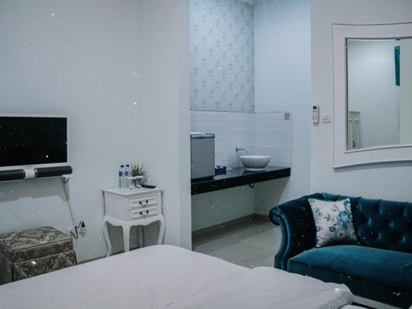 Griya Suryo Wijilan : photo 5 de la chambre chambre lit queen-size deluxe