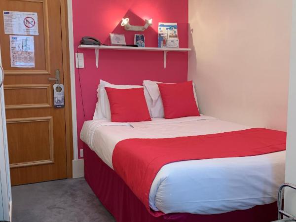 Kyriad Saumur Hyper Centre Hôtel Appartements et SPA soins Sothys Paris : photo 2 de la chambre petite chambre simple classique