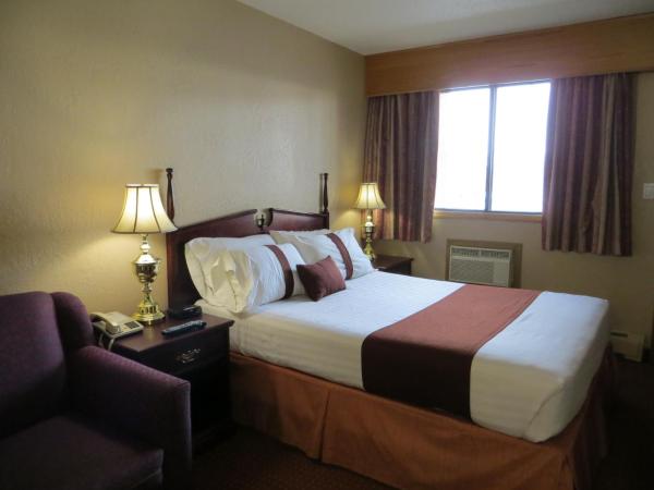Howard Johnson by Wyndham Red Deer : photo 5 de la chambre chambre lit queen-size deluxe - non-fumeurs