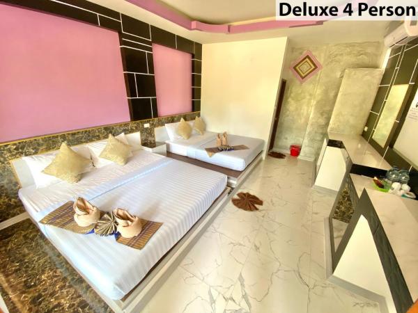 Lanta Emerald Bungalow : photo 1 de la chambre chambre familiale - vue sur jardin