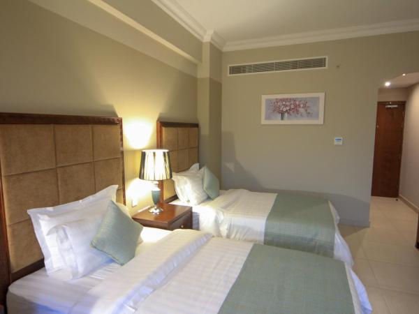 Muscat Inn Hotel : photo 2 de la chambre chambre lits jumeaux Économique