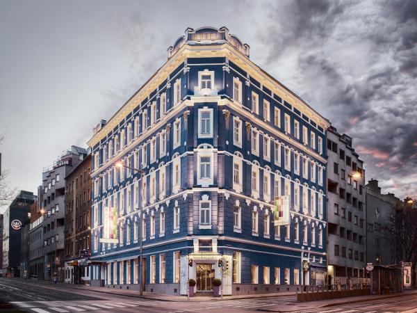 BoutiqueHOTEL Donauwalzer : photo 1 de la chambre chambre triple confort