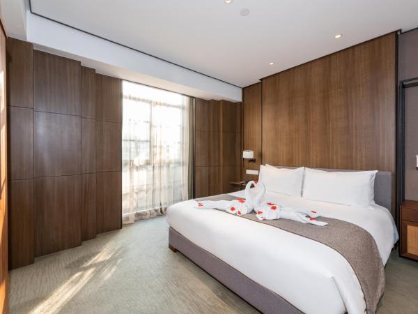 Tea Boutique Hotel West Lake : photo 1 de la chambre chambre lit king-size exécutive
