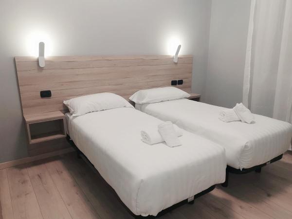Miu Hotel : photo 1 de la chambre chambre lits jumeaux
