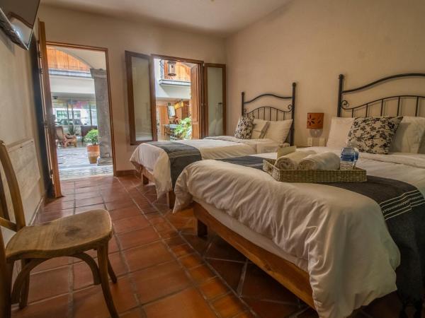 Puerta San Pedro : photo 4 de la chambre petite chambre lits jumeaux