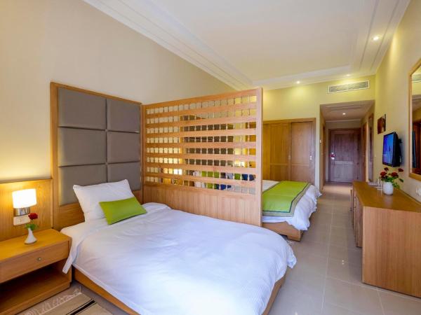 Hotel Bel Azur Thalasso & Bungalows : photo 2 de la chambre chambre quadruple