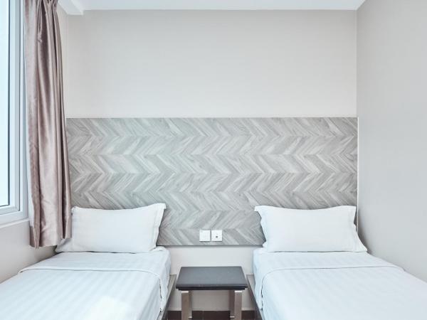 ibis budget Singapore Ruby : photo 3 de la chambre chambre lits jumeaux supérieure