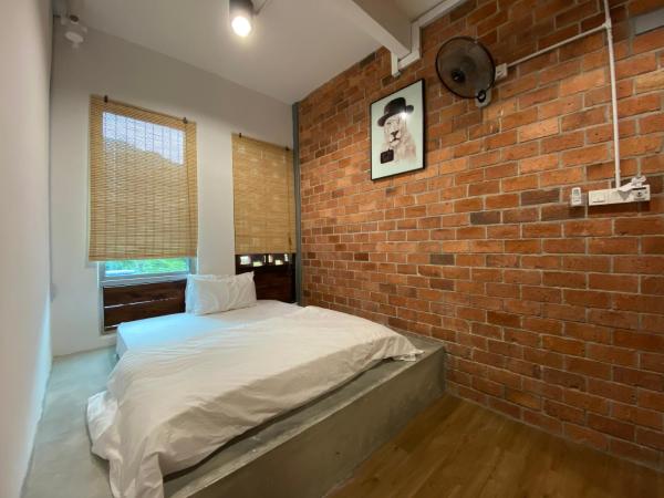 UrbanStay Industrial : photo 1 de la chambre chambre lit queen-size deluxe