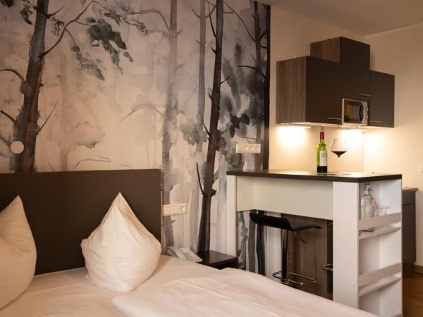 Bergwirtschaft Wilder Mann Hotel und Restaurant : photo 4 de la chambre appartement