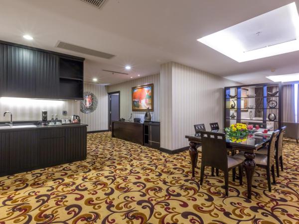 Wyndham Surabaya : photo 5 de la chambre suite présidentielle lit king-size