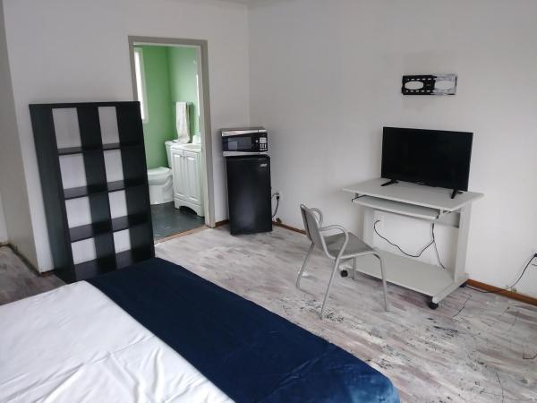 Portland Pensione : photo 1 de la chambre chambre lit queen-size