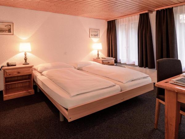 Jungfrau Lodge, Swiss Mountain Hotel : photo 2 de la chambre chambre triple avec salle de bains privative sans vue