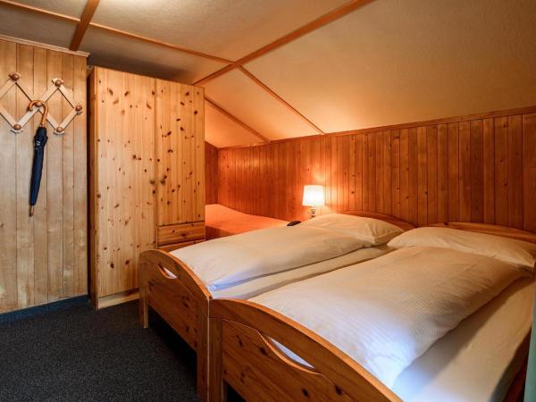 Jungfrau Lodge, Swiss Mountain Hotel : photo 7 de la chambre chambre quadruple avec salle de bains privative