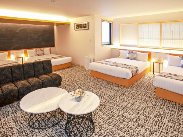 GRAND BASE Osu : photo 2 de la chambre suite familiale