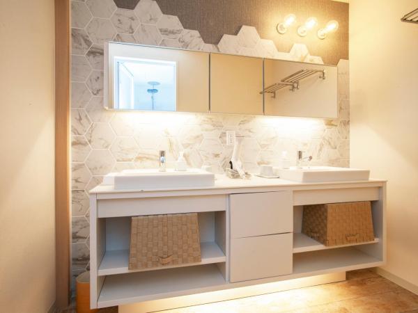 GRAND BASE Osu : photo 4 de la chambre suite familiale