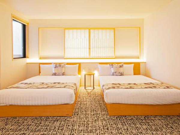 GRAND BASE Osu : photo 6 de la chambre suite familiale