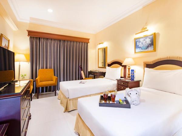 Blue Sky Pandurata Hotel Cikini : photo 1 de la chambre chambre lits jumeaux supérieure avec petit-déjeuner