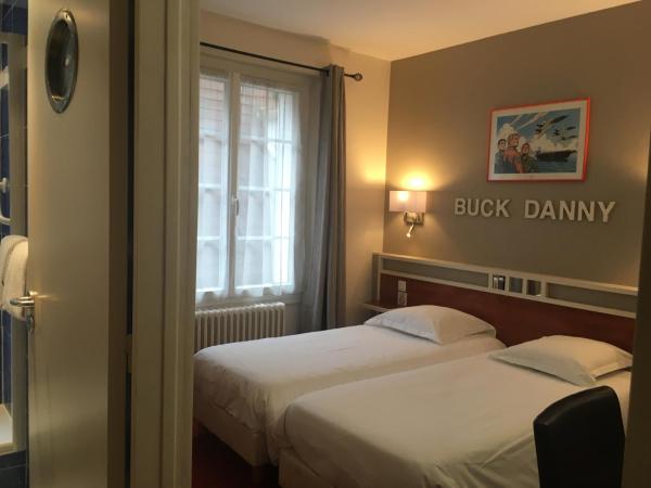 Htel Restaurant LE MONARQUE : photo 2 de la chambre chambre lits jumeaux avec salle de bains privative