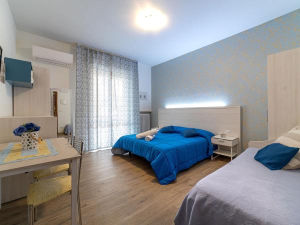 B&B Villa Montreux : photo 7 de la chambre chambre triple avec salle de bains privative