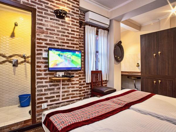 Newa Home : photo 9 de la chambre chambre double ou lits jumeaux avec salle de bains