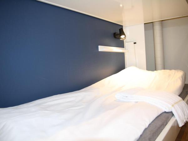 HI Oslo Haraldsheim : photo 2 de la chambre chambre triple Économique avec salle de bains commune