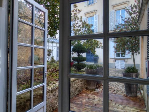 L'HOTEL PARTICULIER - LE MANS : photo 1 de la chambre hébergement l’annexe 