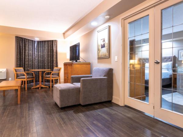 Royal Hotel West Edmonton, Trademark Collection by Wyndham : photo 5 de la chambre suite de luxe 1 chambre avec lit king-size - non-fumeurs