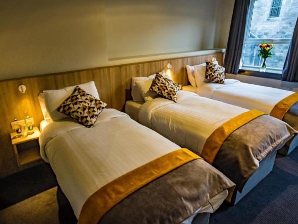 The Old Quarter Townhouse : photo 1 de la chambre chambre triple