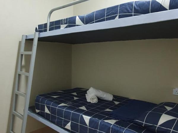 Thian Siong Inn : photo 1 de la chambre chambre lits jumeaux avec salle de bains commune