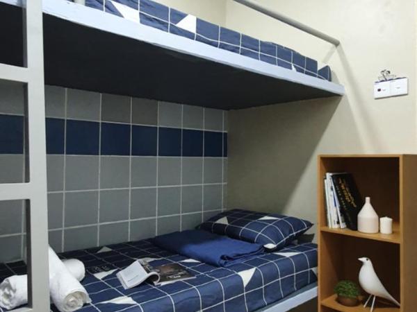 Thian Siong Inn : photo 2 de la chambre chambre quadruple avec salle de bains privative