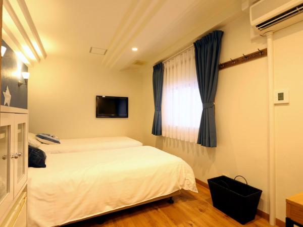 Hotel 3 O'Clock Tennoji : photo 3 de la chambre chambre lits jumeaux avec salle de bains privative