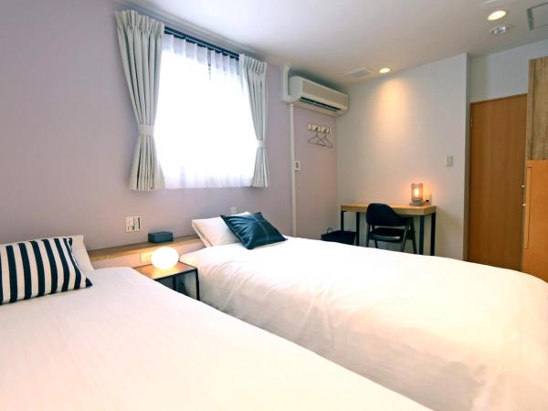 Hotel 3 O'Clock Tennoji : photo 9 de la chambre chambre lits jumeaux avec salle de bains privative