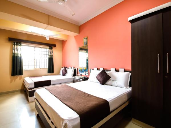 Lusia Inn : photo 1 de la chambre chambre quadruple deluxe