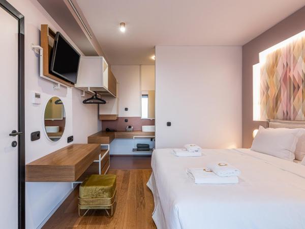 Onira Suite Dreams : photo 5 de la chambre villa happiness 2 chambres avec bain à remous - vue sur mer