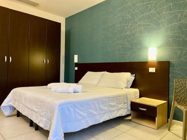 Residence Acqua Suite Marina : photo 6 de la chambre appartement 2 chambres avec balcon