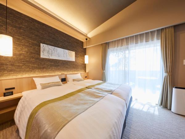 Rinn Shirakawa South : photo 2 de la chambre chambre lits jumeaux deluxe